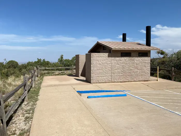 Pine Springs Campground — Vault type restroom located in the tent camping loop. There are 2 parking spaces one is accessible. This restroom is located between the group campsites.
