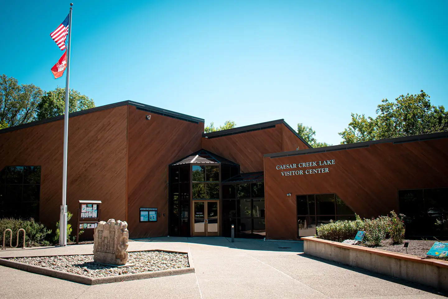 Caesar Creek Lake — Visitor Center with flag and blue skies