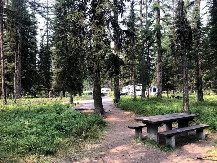 River Point Lolo Campground (MT) — Site 9 Table and Driveway Looking West at Occupied Campsites