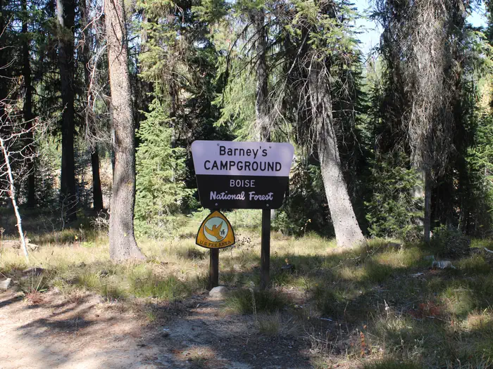 Barneys Campground (Boise National Forest, ID) — Barney's campground sign partially shaded