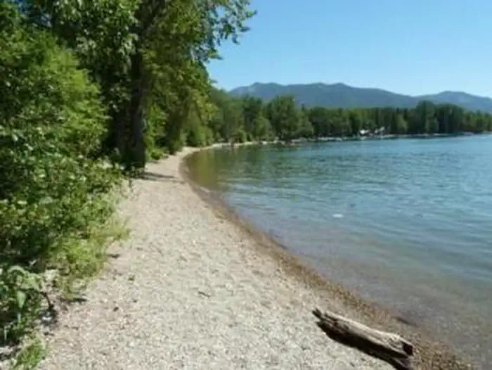 SWAN LAKE CAMPGROUND — Beach and lake front photo