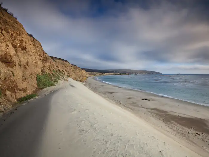 SANTA ROSA ISLAND — White sand dune next to a steep coastal bluff with ocean