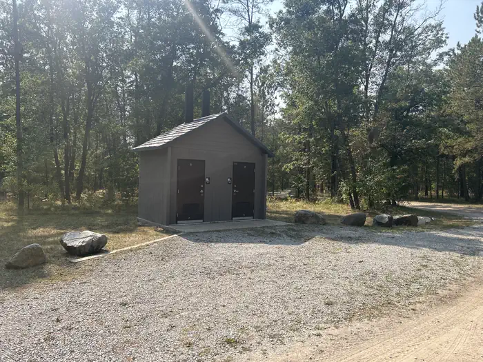 Mack Lake ORV Campground — A photo of vault toilets Mack Lake ORV Campground