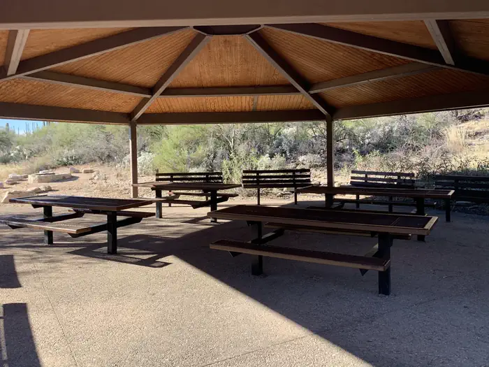 SABINO CANYON RECREATION AREA CACTUS RAMADA 1 — Under the ramada, with a view of picnic tables and benches