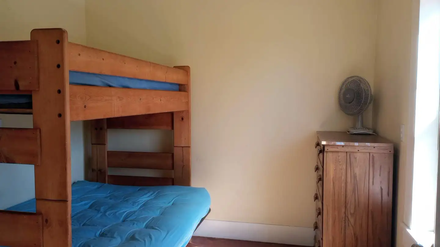 Upper Crossing Guard Station — Master bedroom, equipped with 1 bunk bed and a dresser. Sleeps up to 3