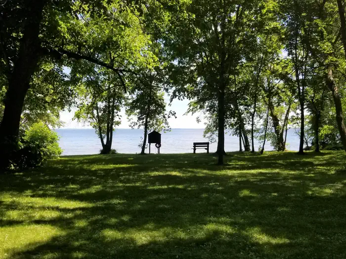STONY POINT — Bench and Beach Along Lake Shore