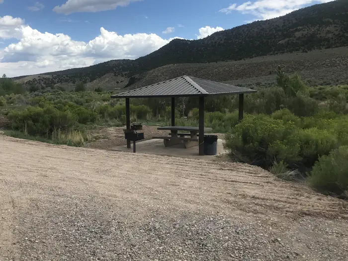 Hanging Rock Campground — A photo of Site 6 at Hanging Rock Campground with Picnic Table & Shade Shelter