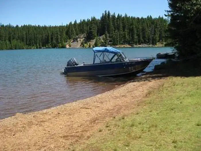 Oak Fork Campground (Timothy Lake, OR) — Boat on the shore of Oak Fork