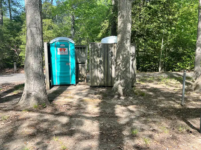 Pax River Paradise Grove Campgrounds — A photo of porta pottie location in Pax River Paradise Grove Campgrounds