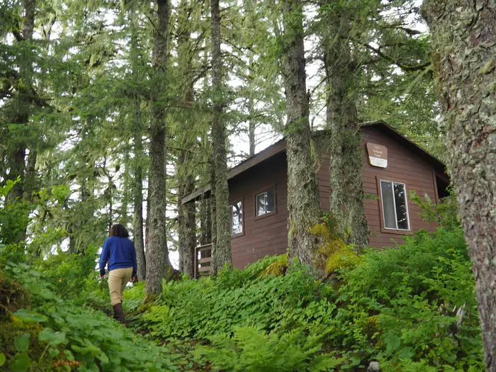 Gut Island 1 Cabin — Person walking up to Gut Island 1 Cabin