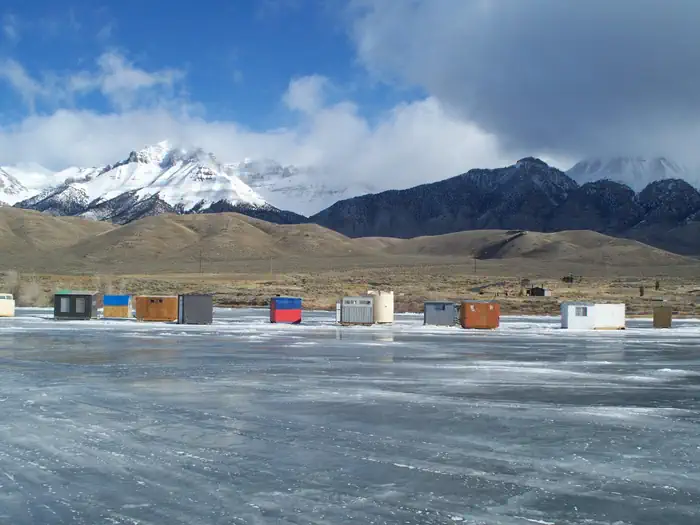 Joe T. Fallini Recreation Site — Ice fishing huts on the reservoir.