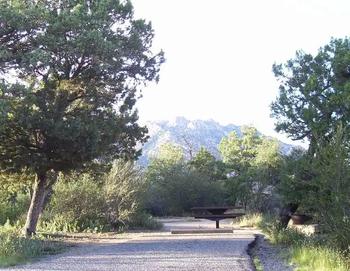Yavapai Campground — Yavapai Campground Site #15 with Granite Mountain in the Background behind the metal table