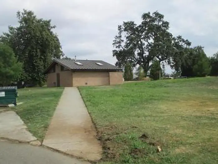Sycamore Grove (red Bluff) Campground — Bathhouse with flush toilets, quarter operated showers