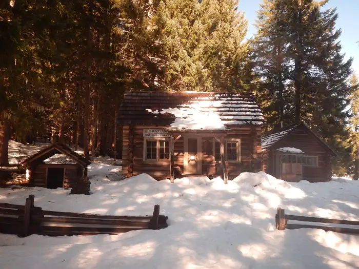Fish Lake Remount Depot Cabins — Commissary Cabin (building to right of foreground building with sign)