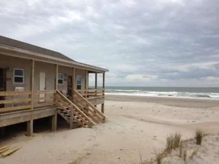 Long Point Cabin Camp — Long Point Cabin Camp with beach in the background