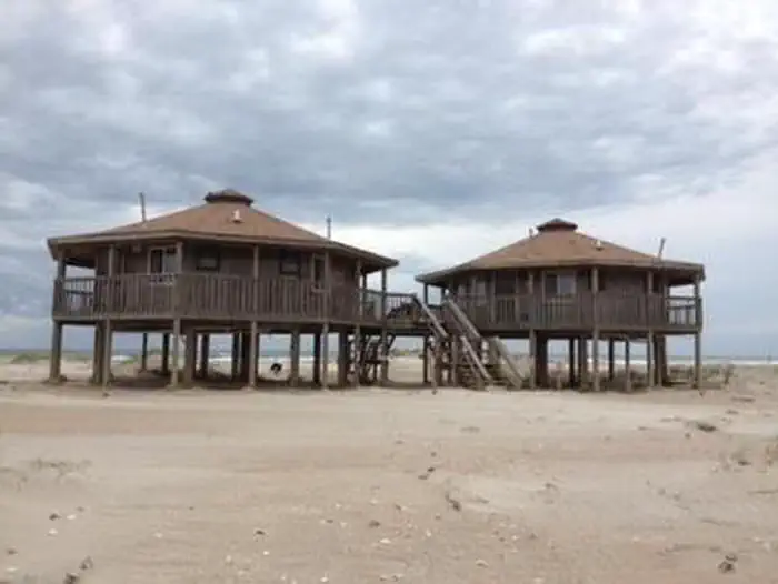 Long Point Cabin Camp — Long Point Cabins 5,6,7 and 8 under a cloudy sky