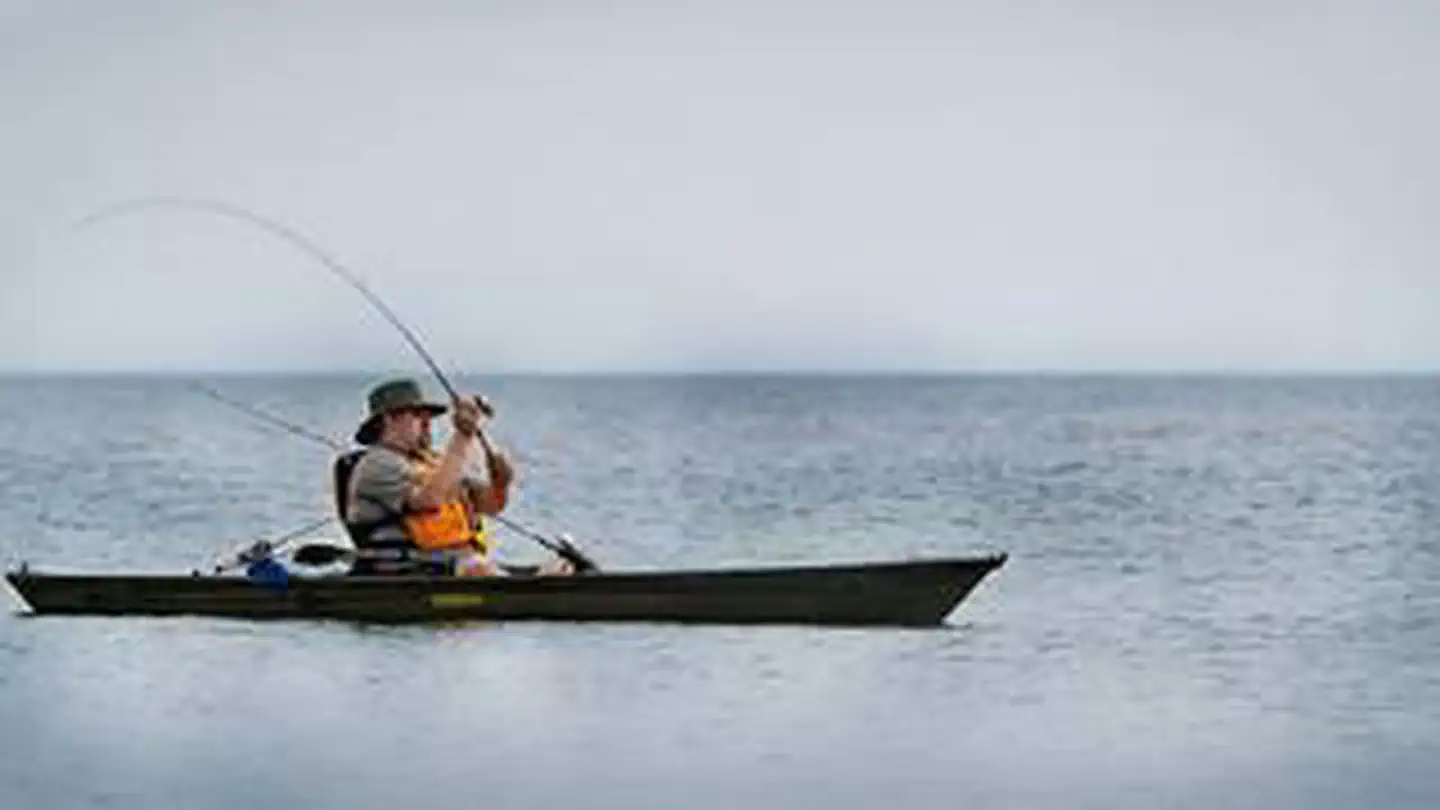 Dunewood Campground — Park Ranger fishing during a program at Indiana Dunes National Park.