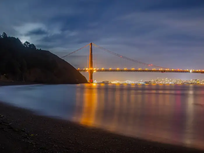 Kirby Cove Campground — A view of the bay from Kirby Cove, with the Golden Gate Bridge lit.