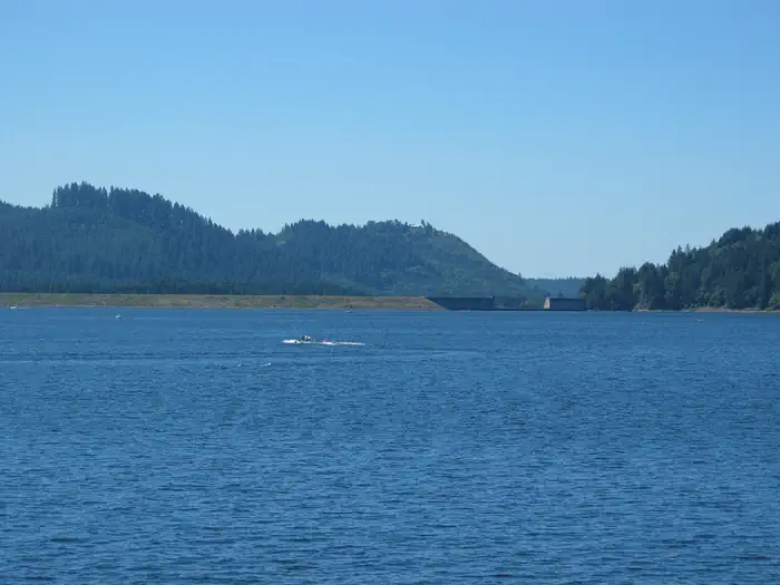 Dorena Lake — A boat on Dorena Lake with the dam in the background