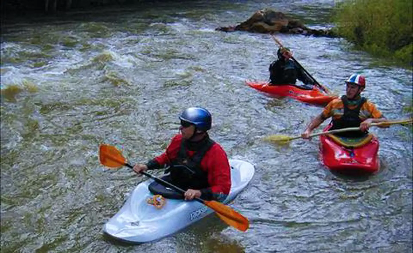 Gillham Lake — kayakers paddling swift water