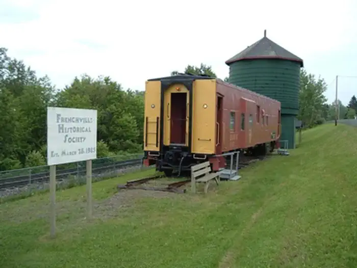 Maine Acadian Culture — Bangor/Aroostook Caboose & Green Water Tank