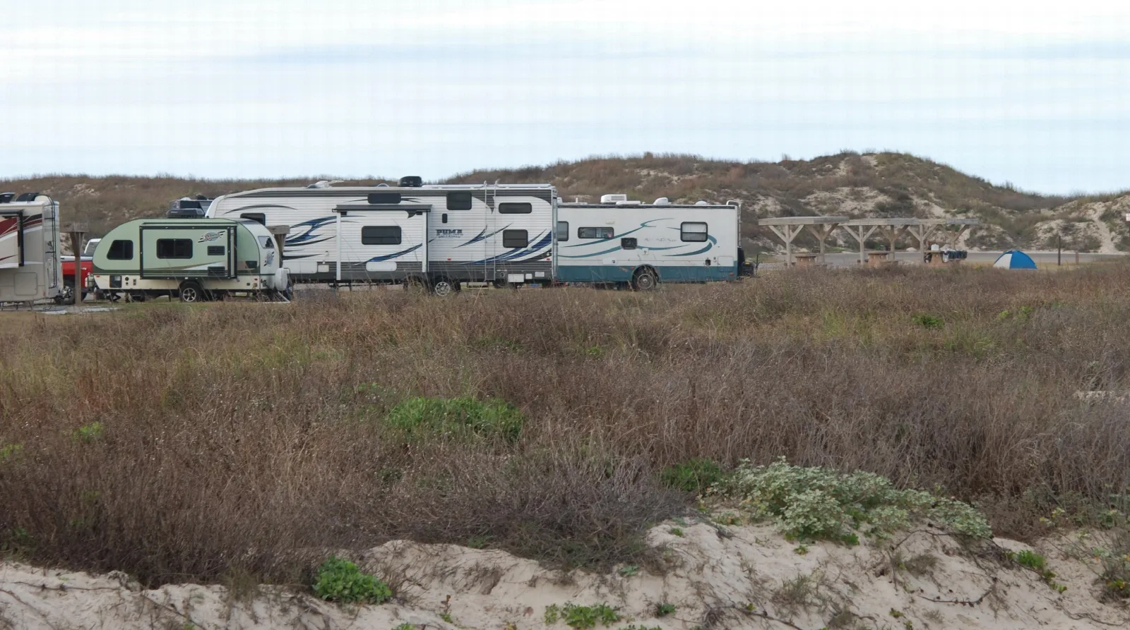Malaquite Campground - Padre Island National Seashore: Gravel sites viewed from boardwalk