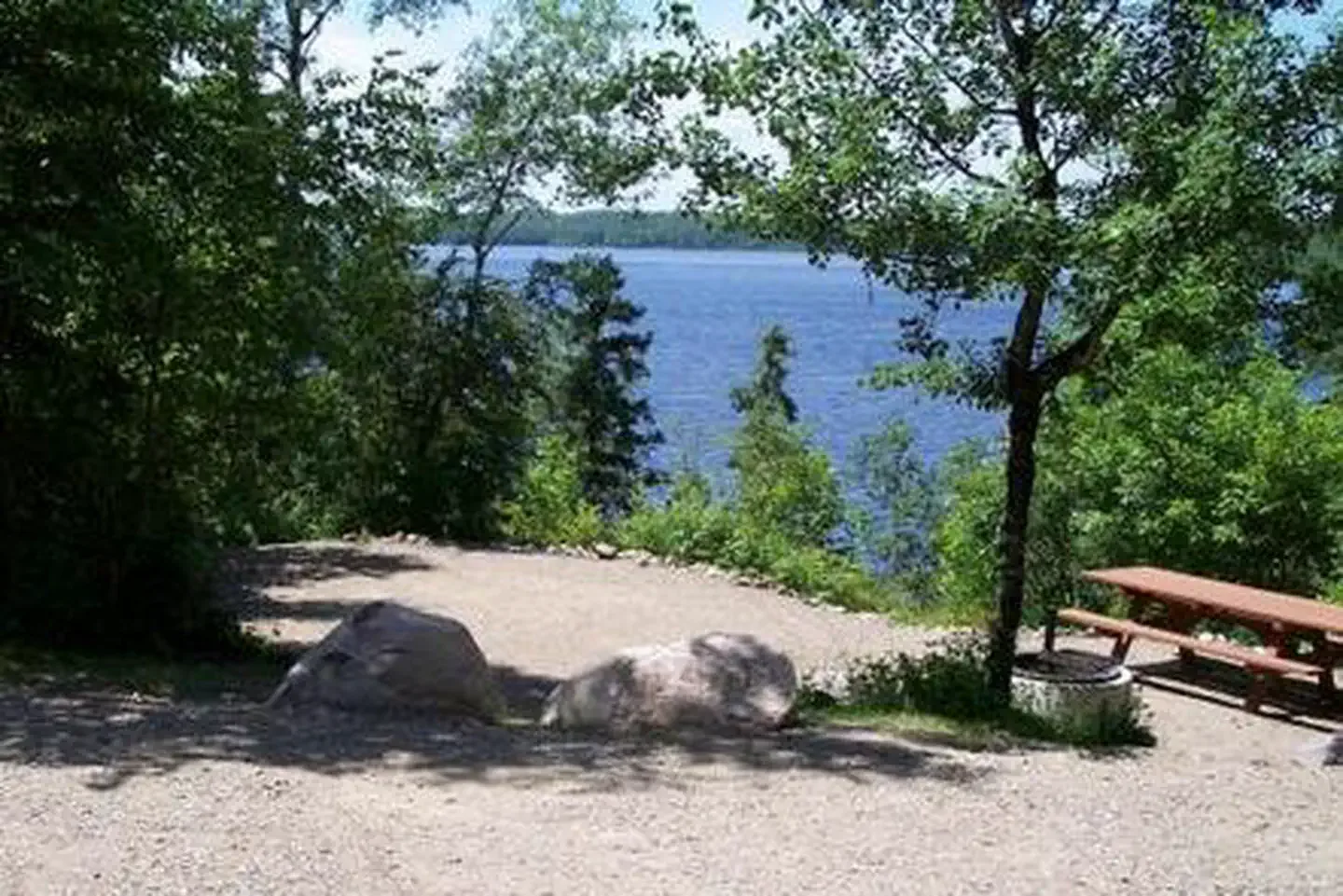 Superior National Forest Fall Lake Campground: Picture of campsite and lake in the background.
