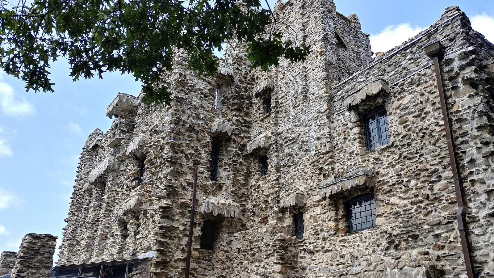 Close view of the castle's rough stone walls and windows