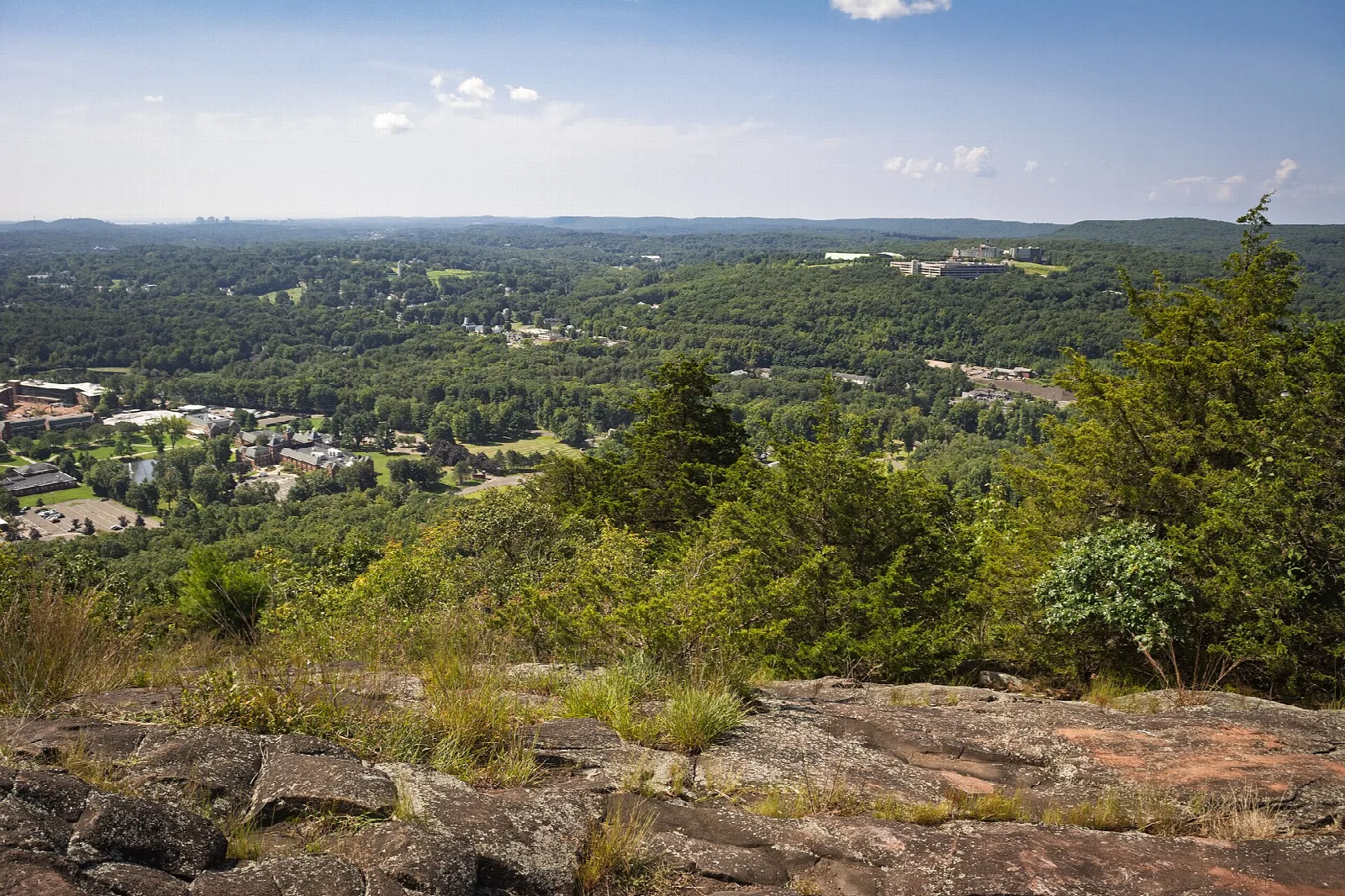 Town and hills seen from a rocky overlook