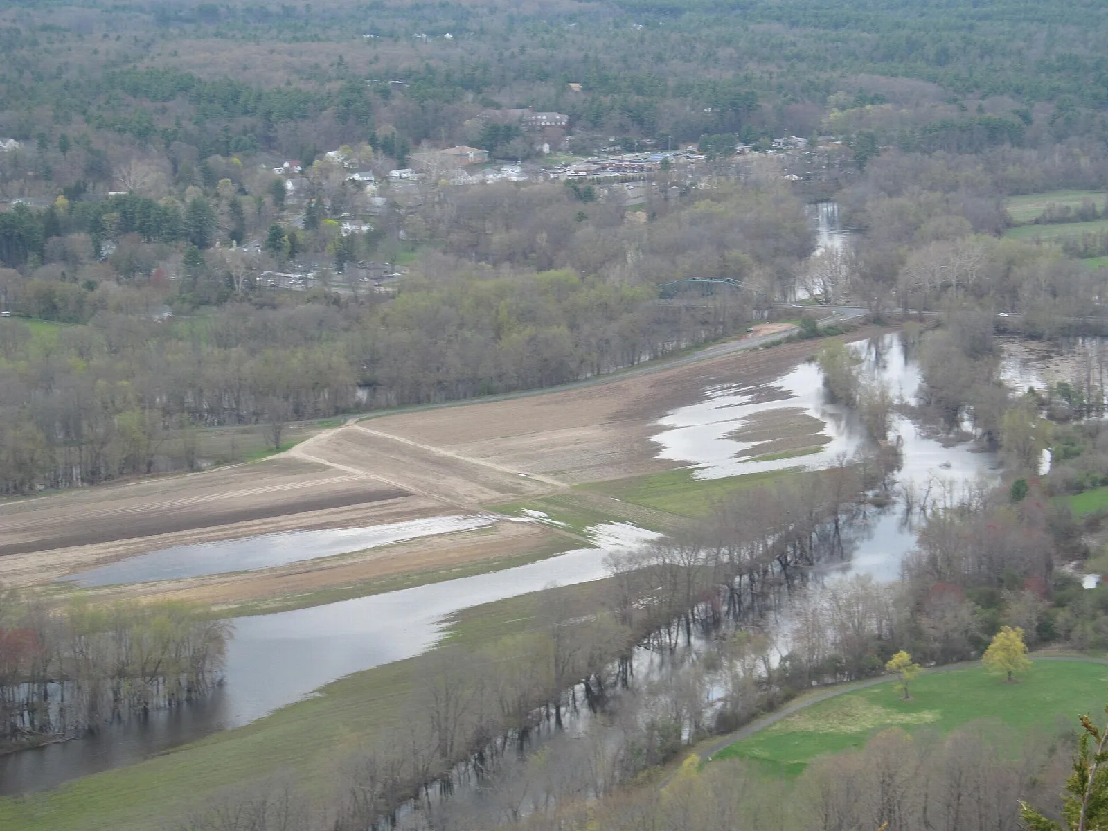 River valley with water and farm fields seen from above