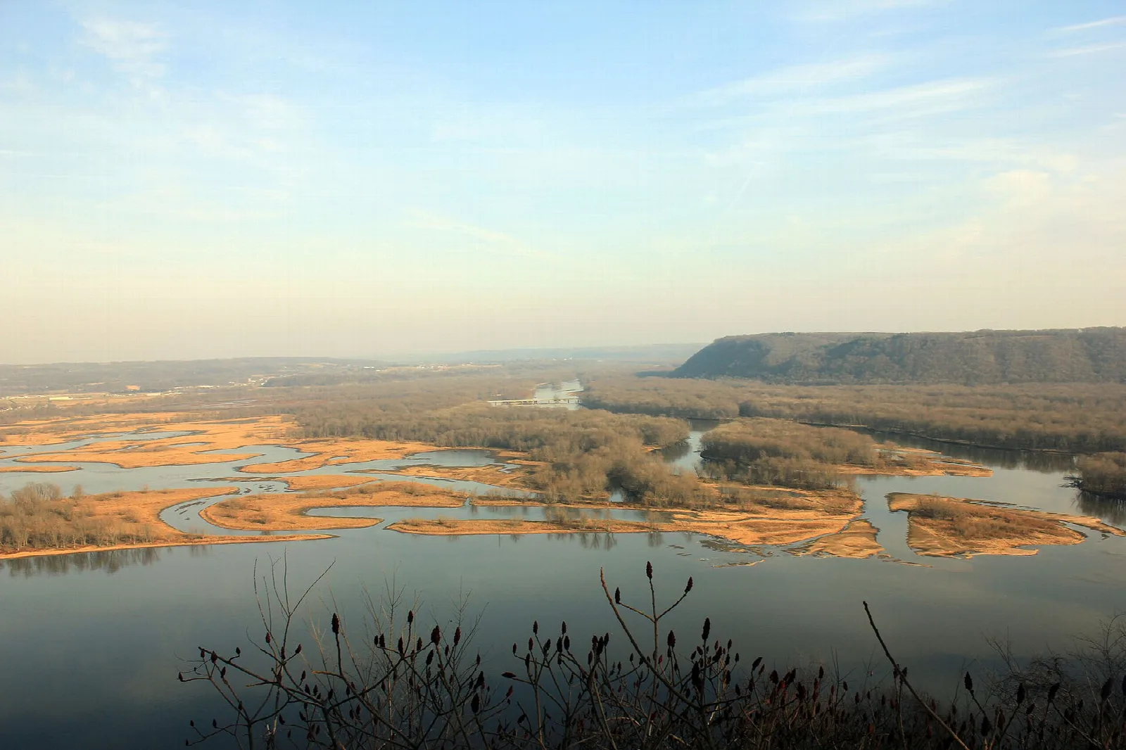 Mississippi River channels and sandy islands seen from a high bluff in low sun