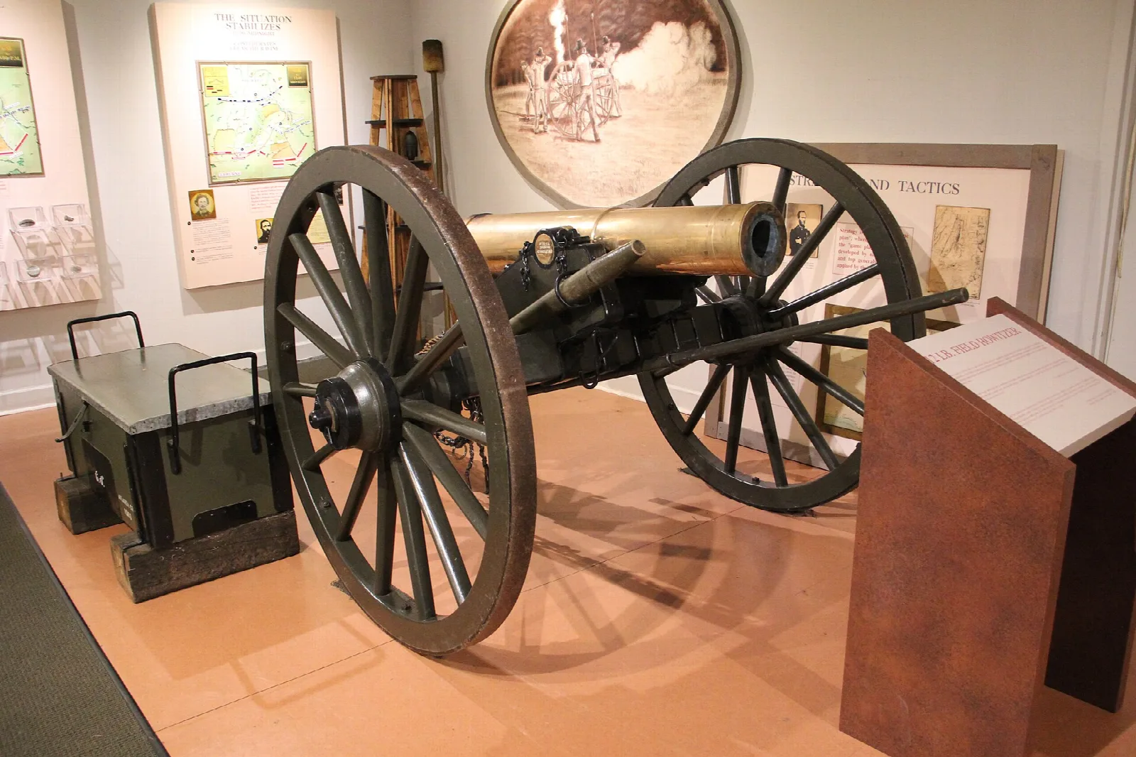Field cannon on display in a museum room