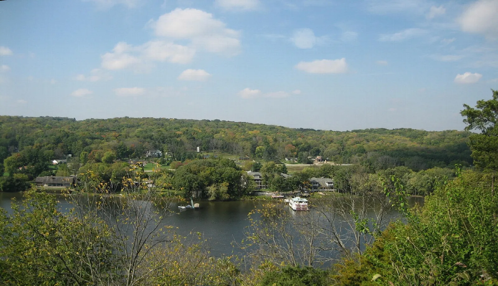 Rock River with homes and boats seen from a bluff overlook