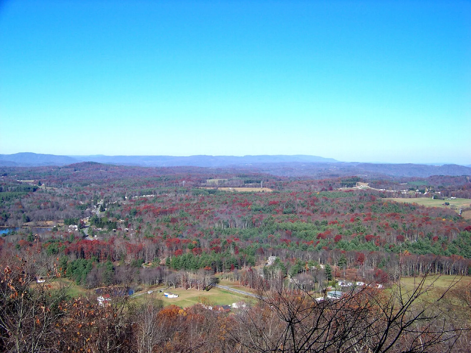 Long view over rolling forested hills from a lookout tower