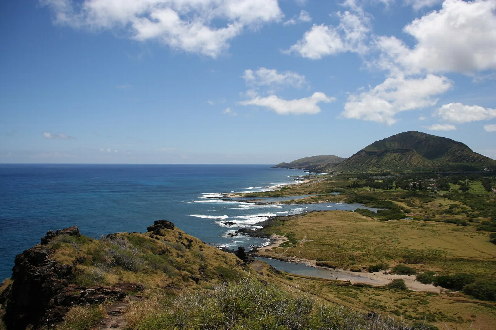 Rocky headland in the foreground with Koko Head and blue sea beyond