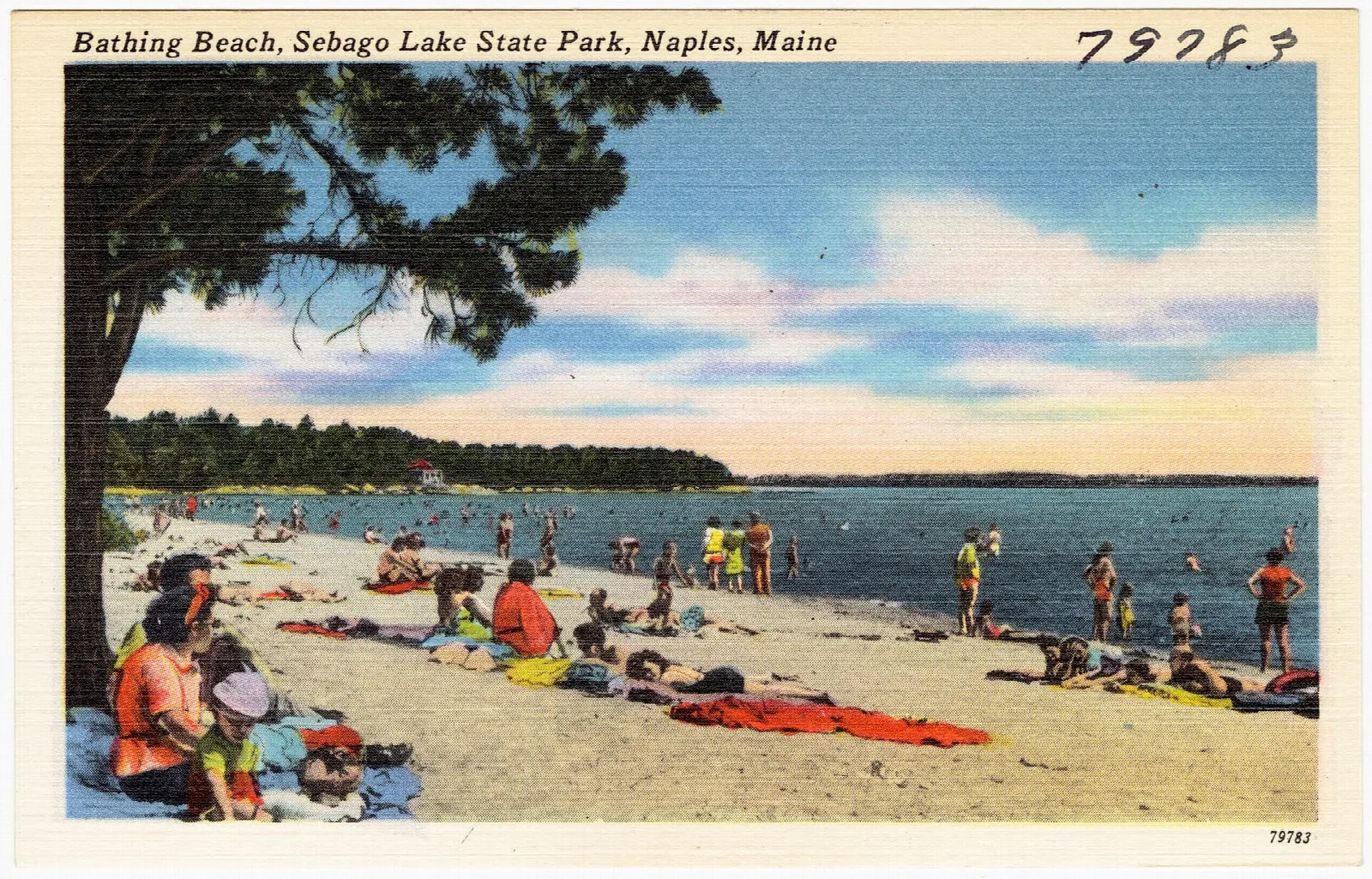 Vintage postcard of people on a sandy lake beach under a pine tree
