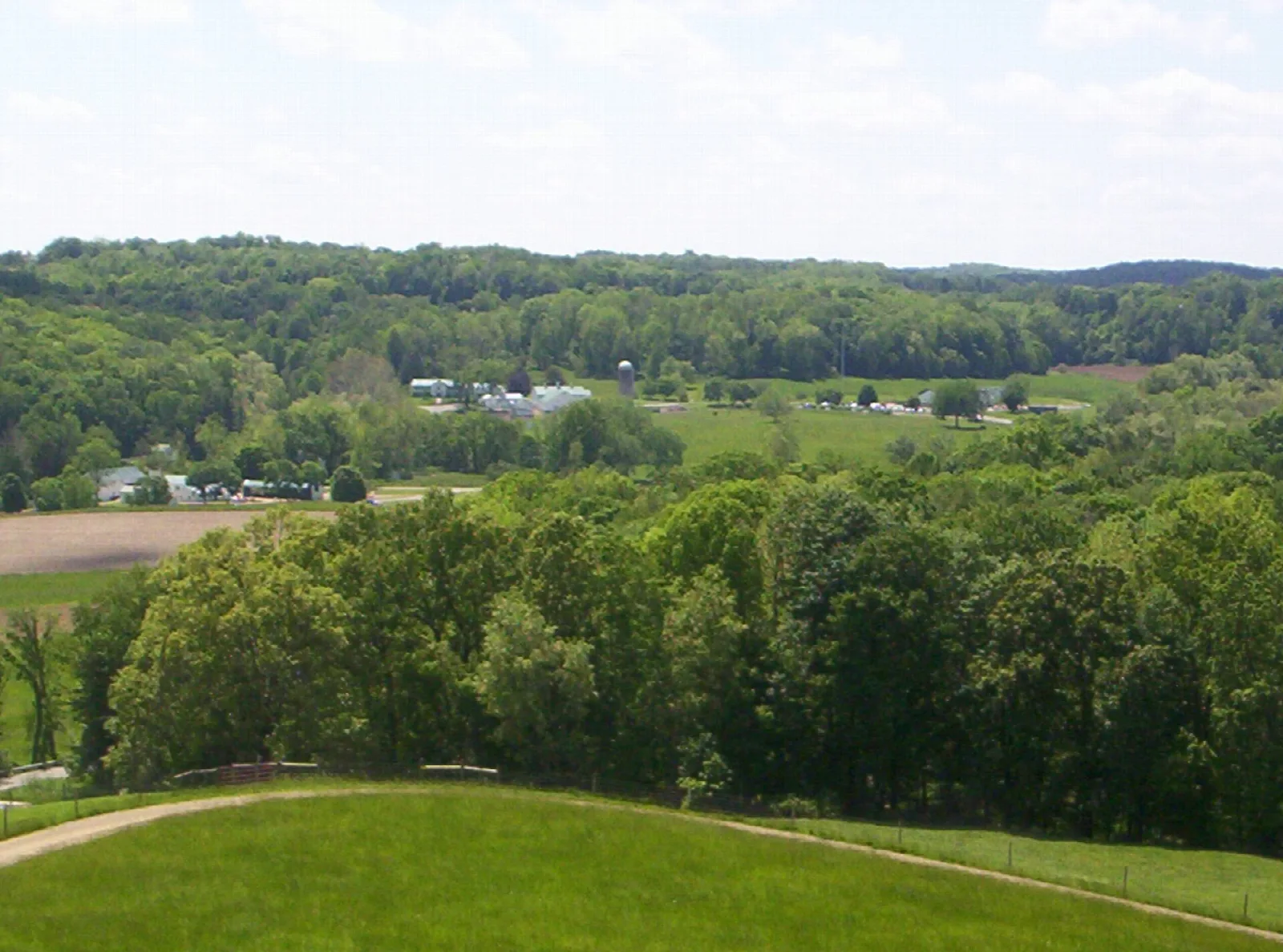 Wooded valley and farm fields viewed from the overlook