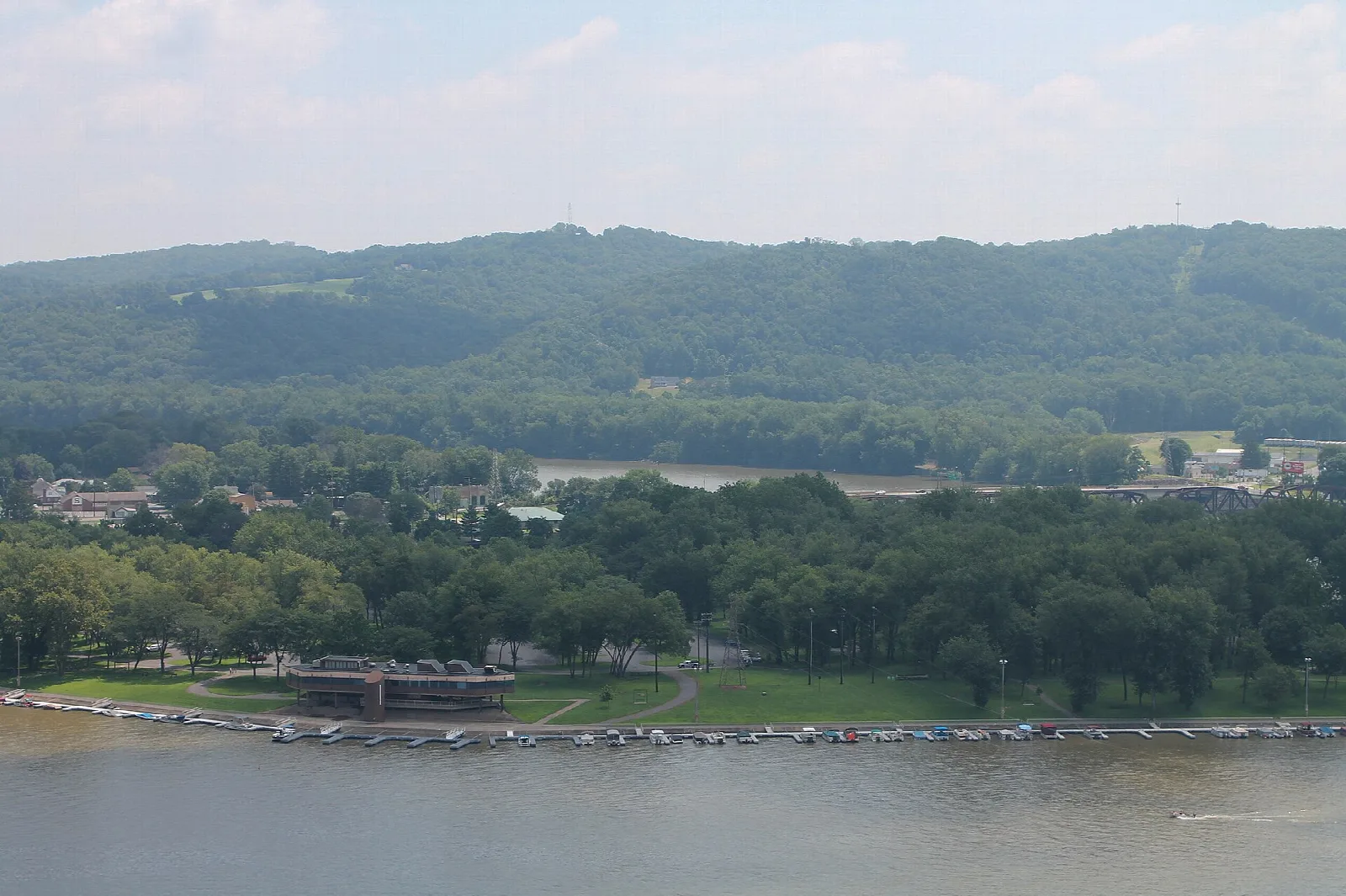 Marina on the tip of an island with lawns and trees