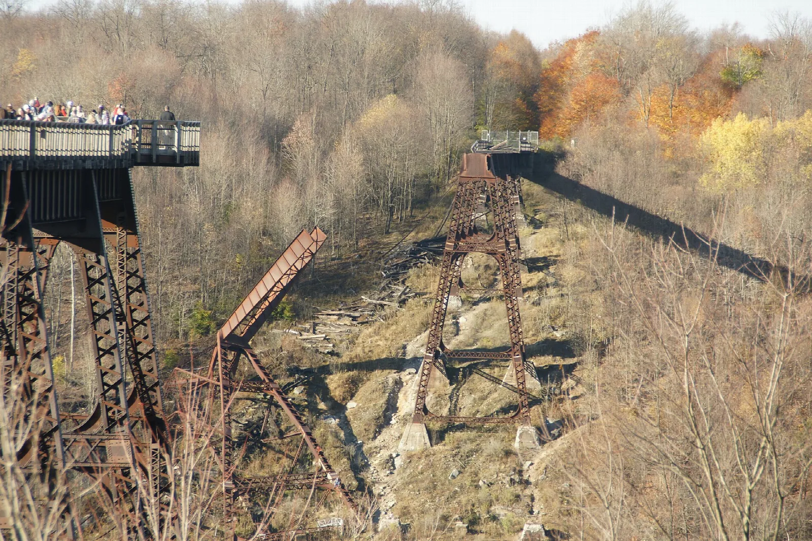 Fallen steel towers on a gorge slope beside the viewing platform