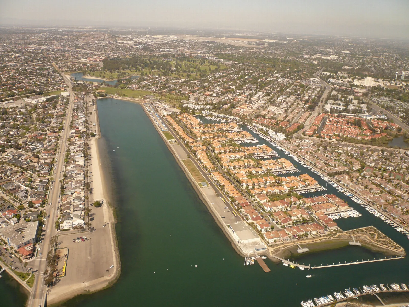 Aerial view of the long rowing channel lined with houses
