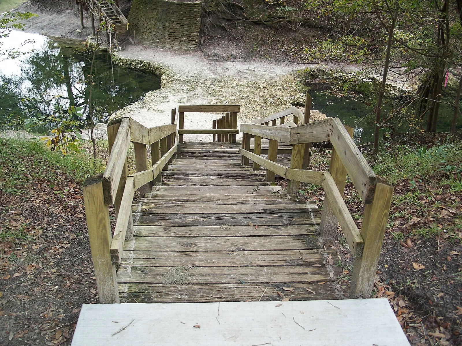 Wooden stairway down to the spring