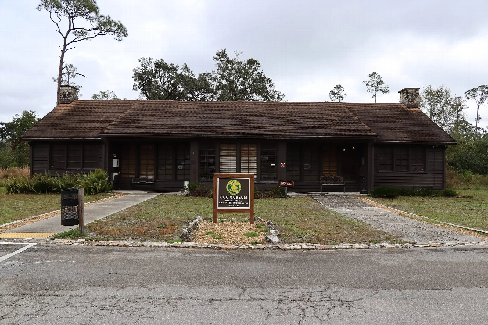 Low wooden museum building with a brown roof