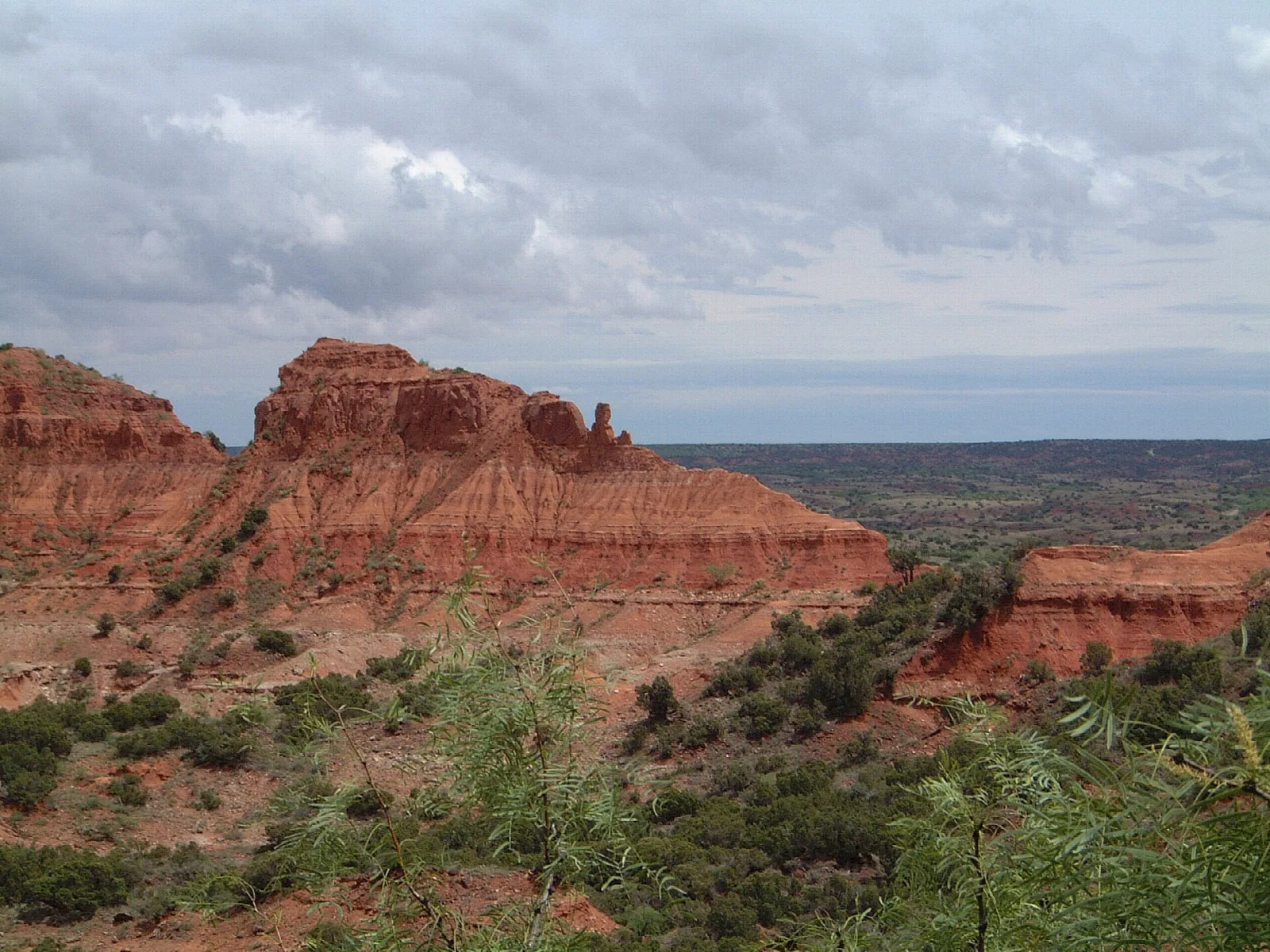 Red rock buttes and canyon seen from a ridge