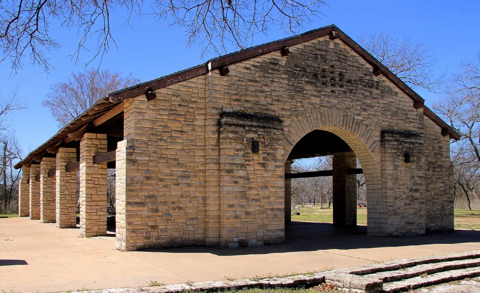 Open stone pavilion with arches and columns