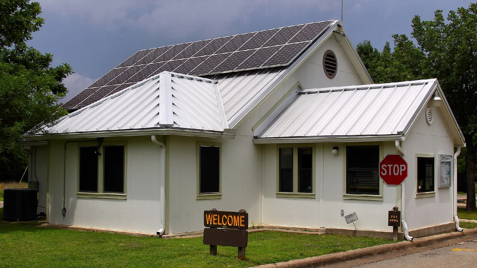 White park office building with a metal roof and solar panels