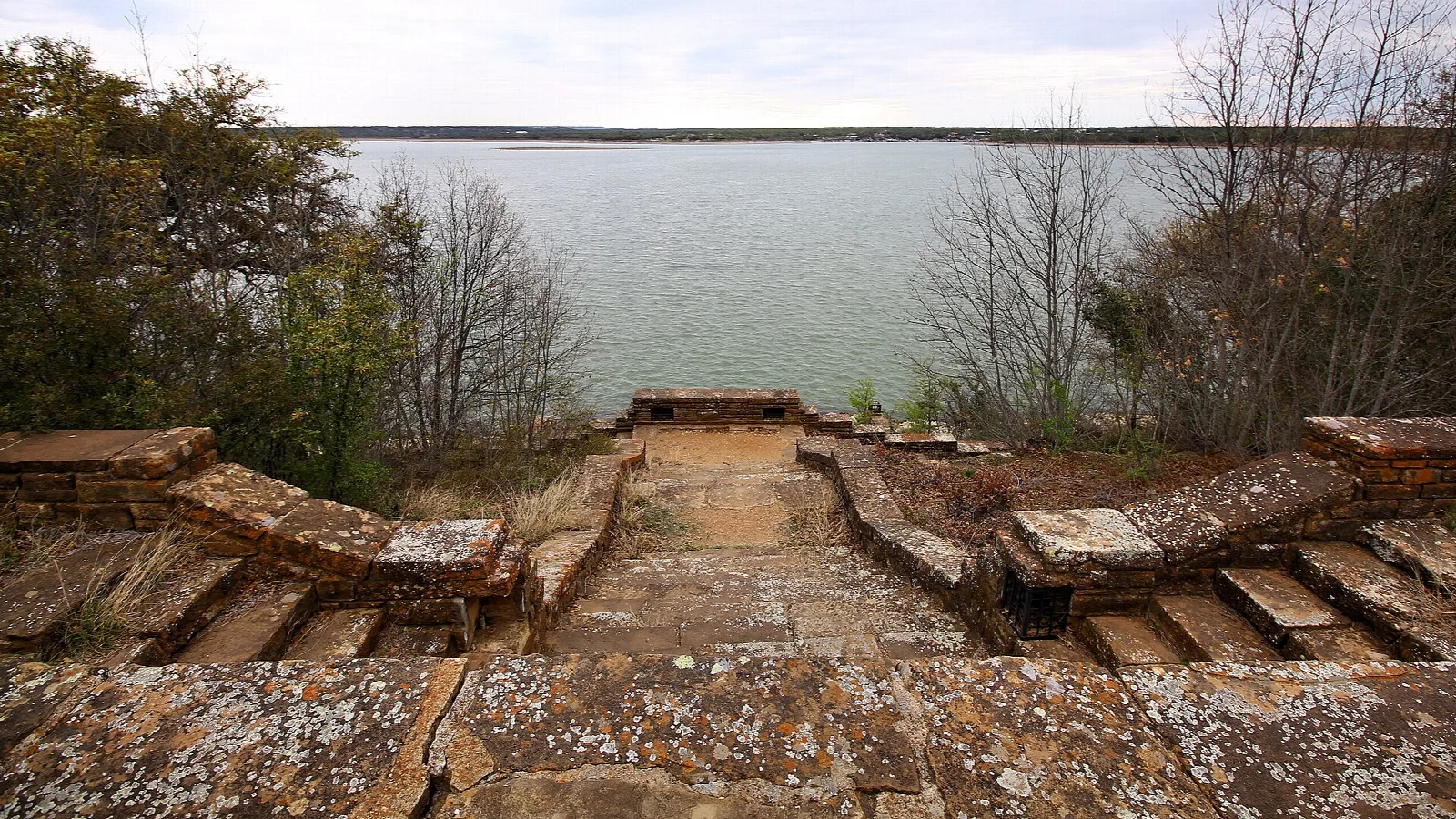 Stone steps leading down toward a lake